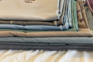 Shawls from Afghanistan, India, Pakistan stacked Shawls from Afghanistan, India, Pakistan stacked